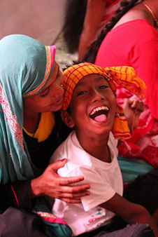 Bangladeshi boy with cerebral palsy